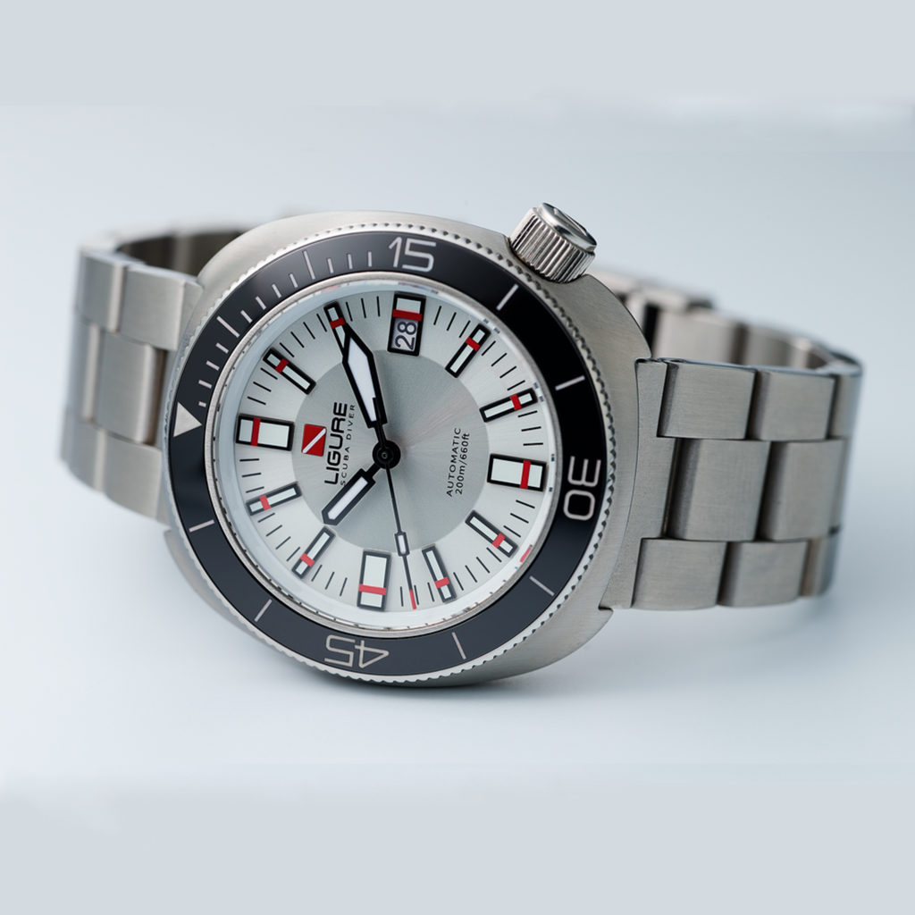 Sunlit Silver dial with stainless steel bracelet showing the refined sunburst finish