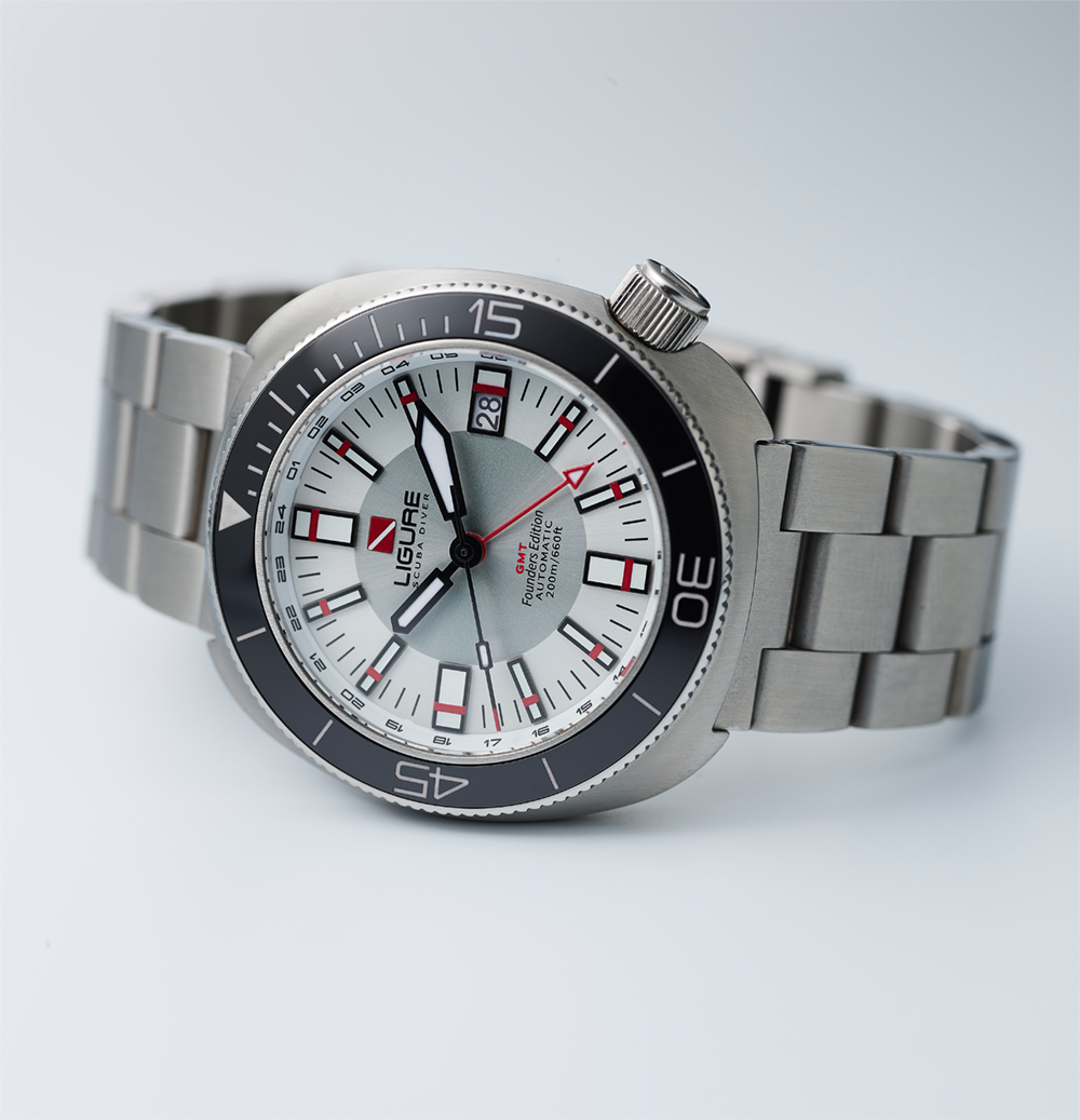 Silver LWT21008_Founders_Edition_GMT wristwatch with a white face on a light gray background